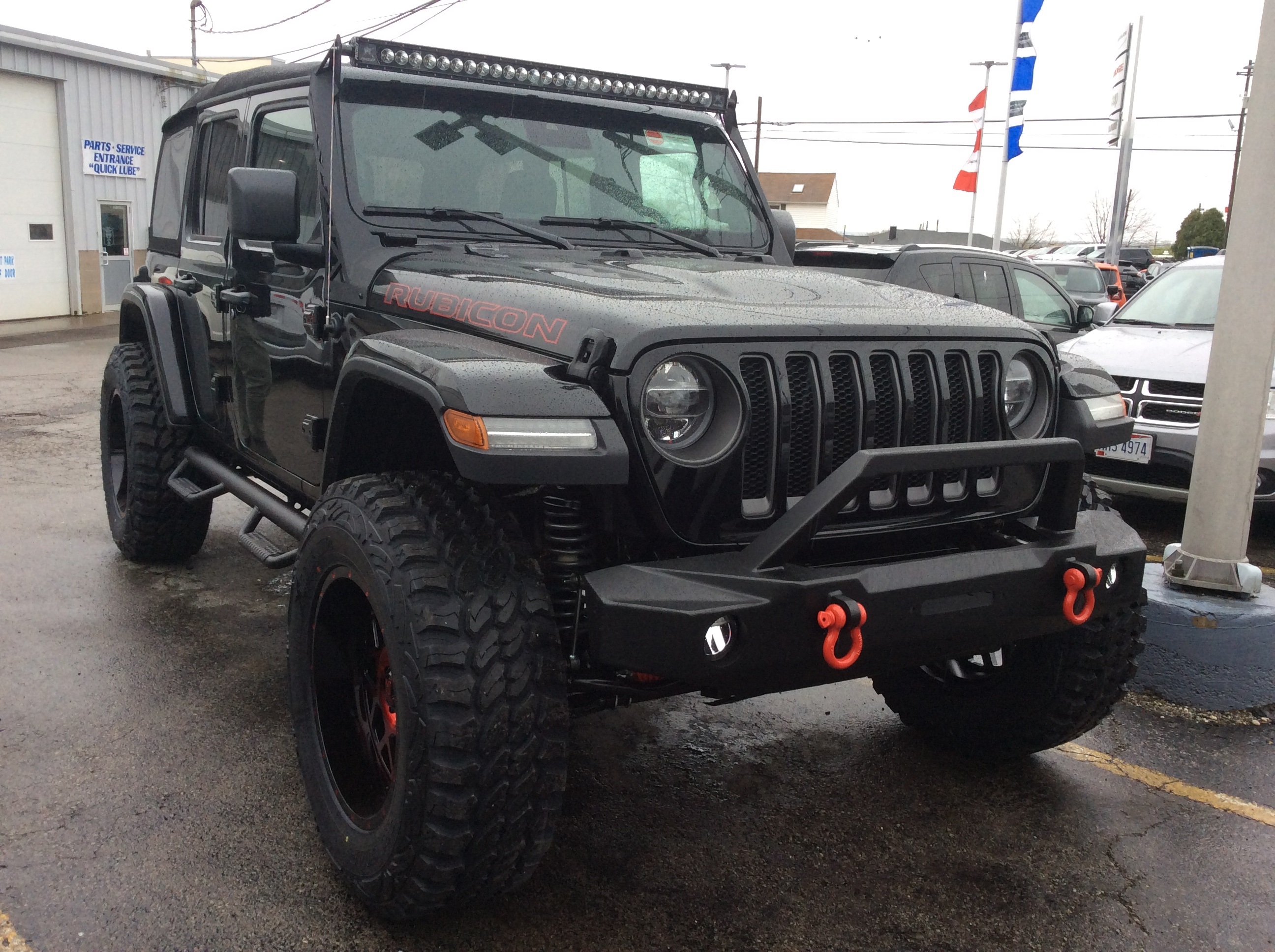 lifted JK Wrangler 2014 Dune color with Atlas bumpers from DSI